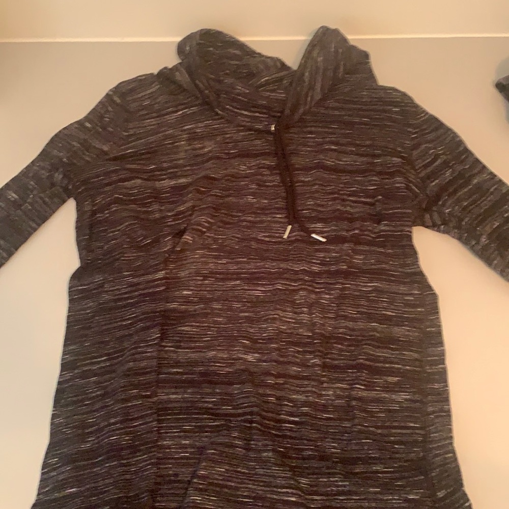 white and black turtle neck jacket